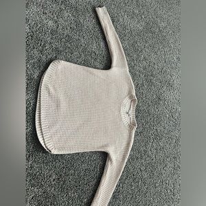 i’m selling this light cute pink sweater in a size small.